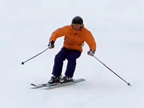 Skier floating across the slope as a result of a good impulse